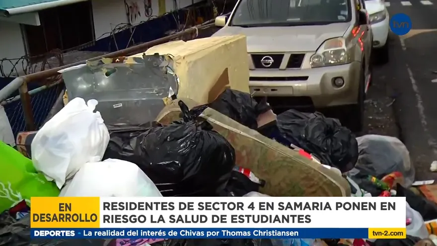 Mala disposición de la basura cerca de una escuela en Samaria