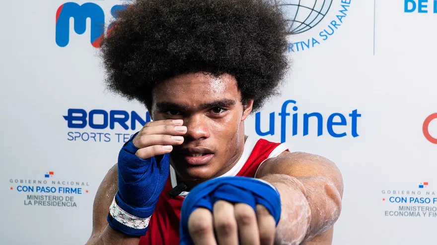 Norman Simmons medalla de oro en boxeo