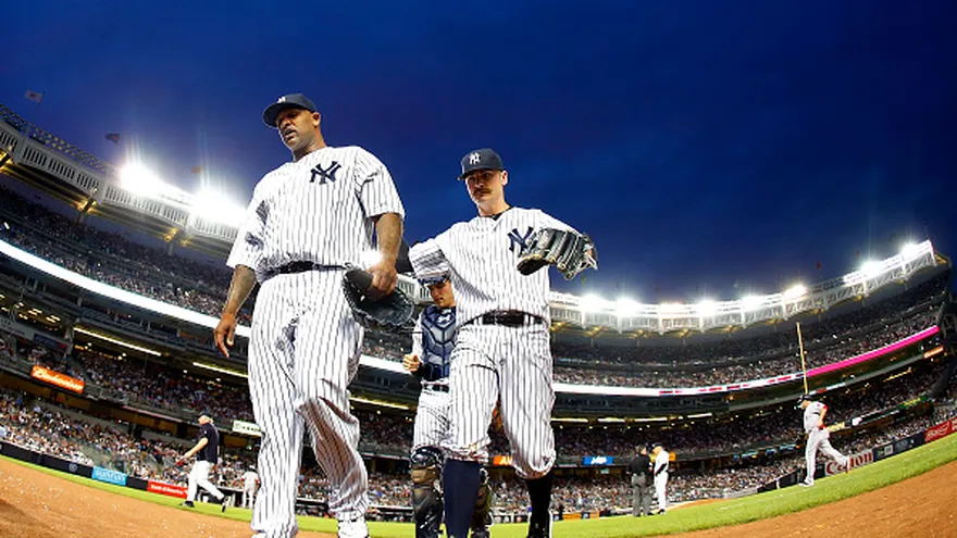 CC Sabathia y Brendan Ryan.