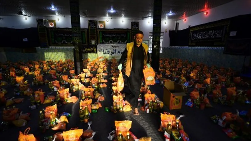 En un Irak confinado y solidario, comida gratis y máscaras caseras para los pobres