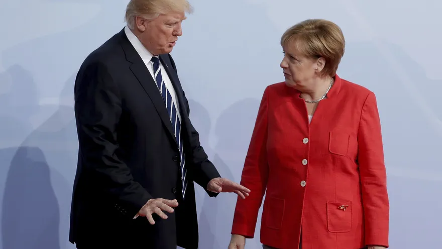 La canciller alemana, Angela Merkel y el presidente Donald J. Trump, a su llegada a la cumbre de líderes de estado y gobierno del G20, celebrada en Hamburgo (Alemania) el pasado mes de julio
