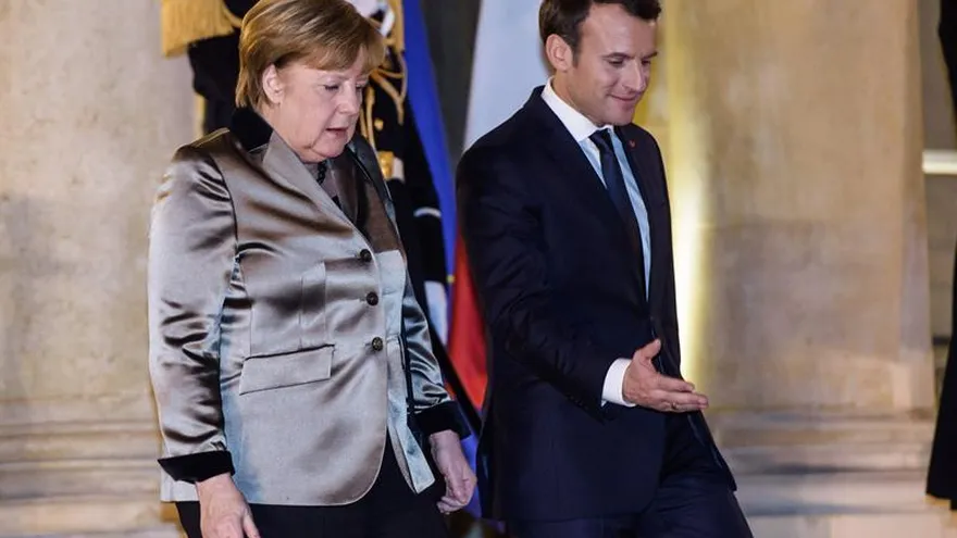 Merkel y Macron piden una globalización más justa en Davos