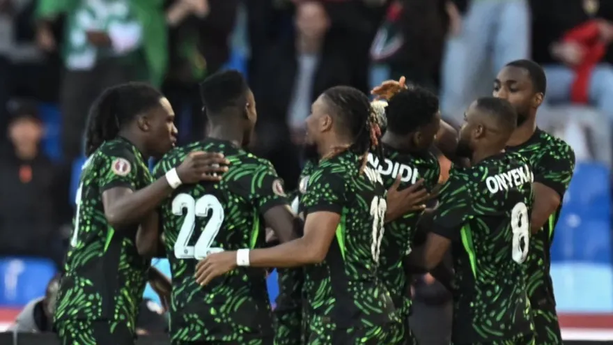Nigeria's goalkeeper #23 Stanley Nwabali celebrates after Nigeria scored their first goal during the Africa Cup of Nations (CAN) quarter-final football match between Algeria and Nigeria at the Grand stadium in Marrakesh on January 10, 2026. (Photo by Paul ELLIS / AFP)