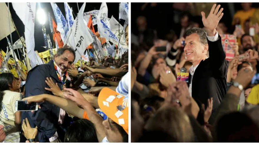 El candidato presidencial oficialista Daneil Scioli y candidato conservador Mauricio Macri.