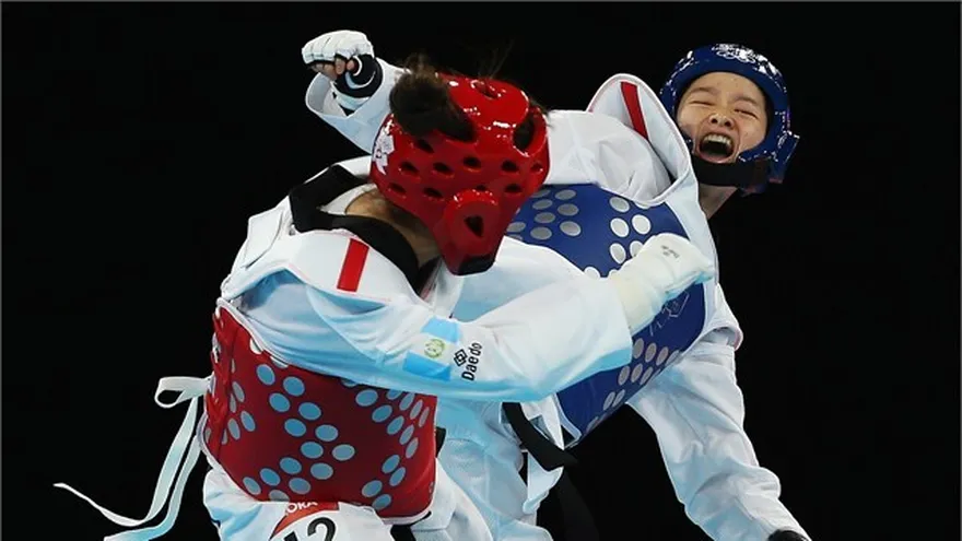 Wu le da a China el oro en el taekwondo de 49 kgs.