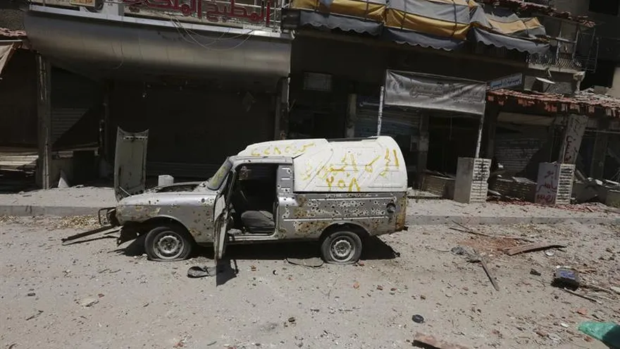 Vista de una calle destruida en Siria.