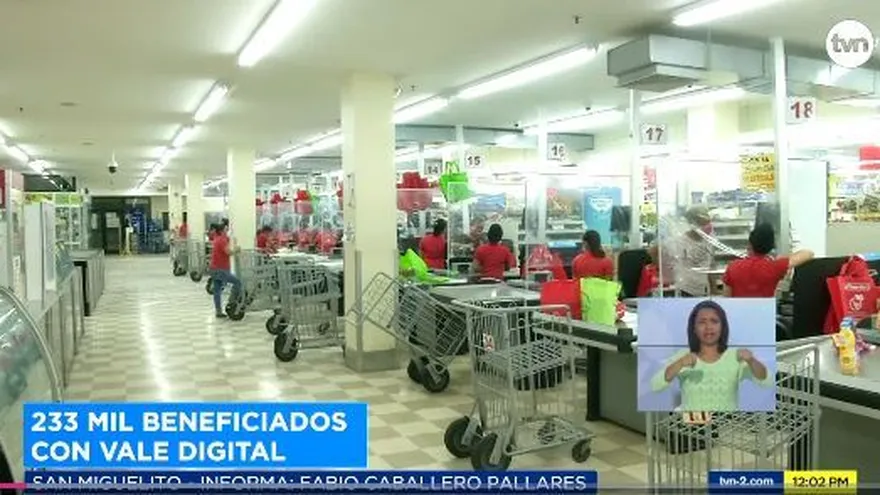 Largas filas en los supermercados para cambiar el vale digital