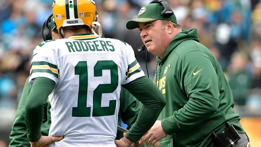 Mike McCarthy junto a Aaron Rodgers