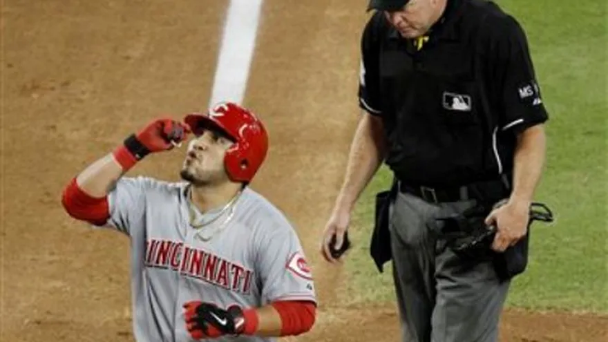 Navarro y Heisey la sacan del parque por los Rojos