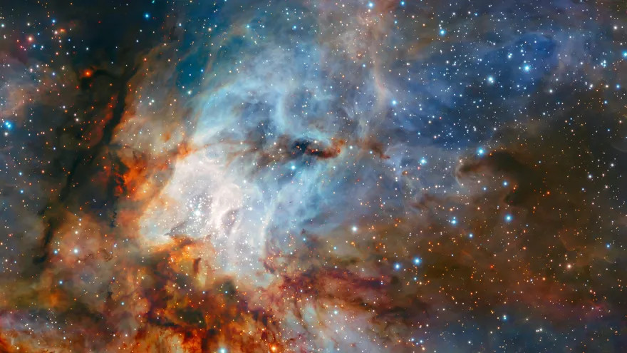 Fotografía cedida por el Observatorio Europeo Austral (ESO) el 11 de julio de 2018 que muestra el cúmulo estelar RCW 38 y sus nubes circundantes de gas brillante