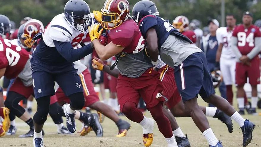 Texans contra Redskins durante la práctica