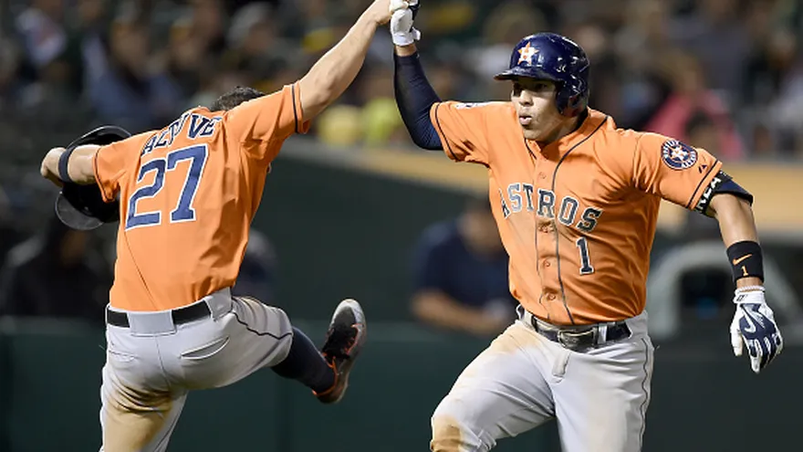 José Altuve y Carlos Castro.
