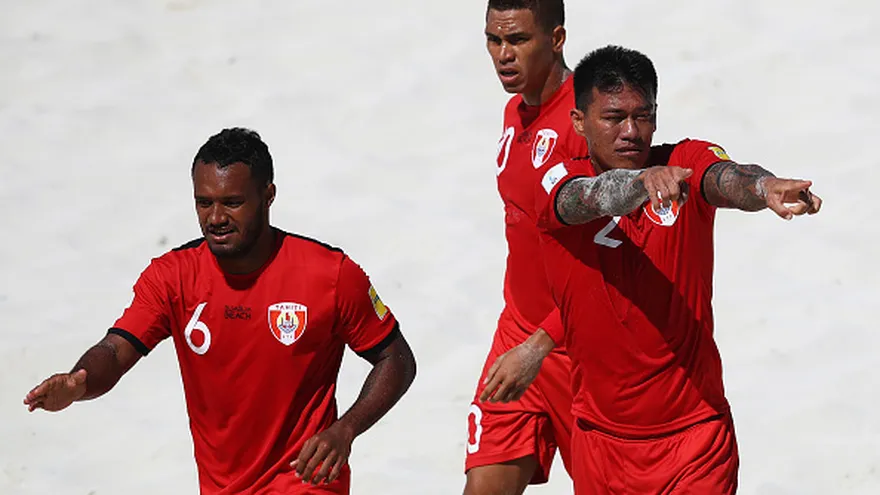 Angelo Tchen (2) celebra el gol anotado a Polonia