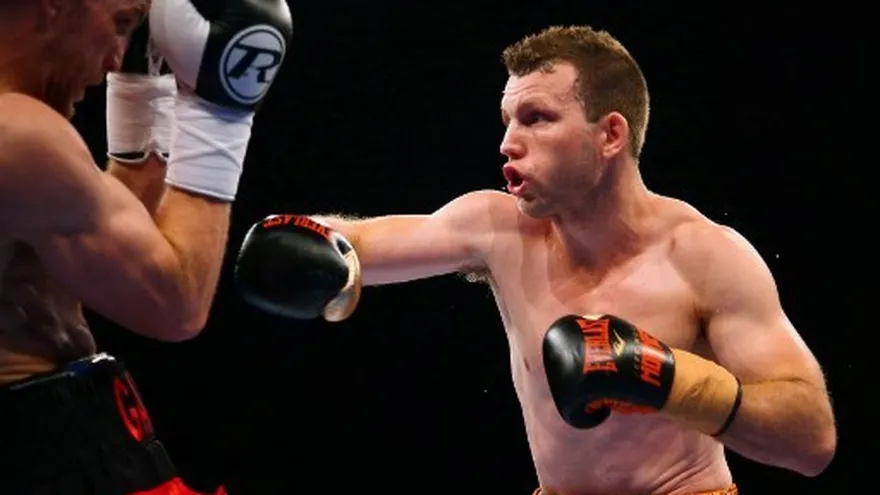 Jeff Horn (d) conserva su título OMB del peso wélter.