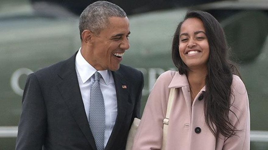 El presidente de los Estados Unidos, Barack Obama, junto a su hija mayor Malia