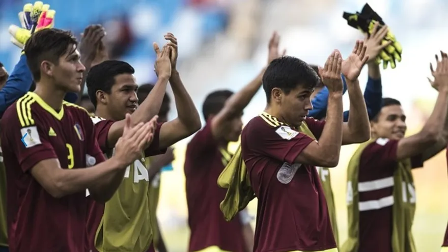 Los jugadores venezolanos celebran la victoria.