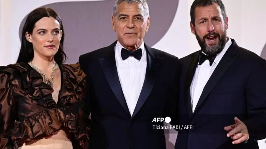 George Clooney y Emma Stone brillan en una Mostra de Venecia pasada por agua