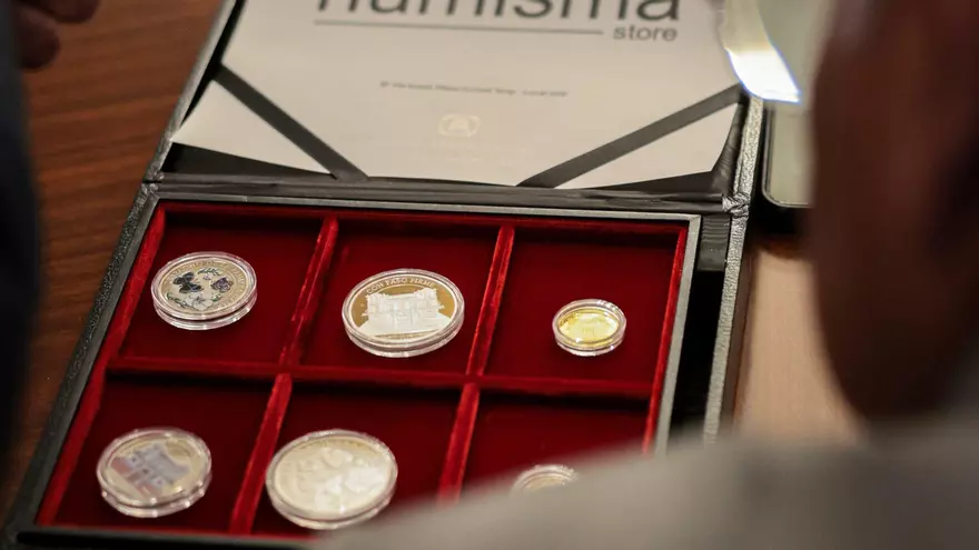 Modelo de monedas a acuñar