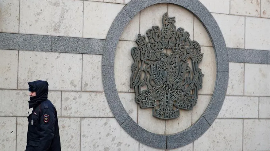 A Russian policeman guards outside the British embassy in Moscow, Russia, 17 March 2018. EFE Photograph 2: British Ambassador to Russia Laurie Bristow leaves the Russian Foreign Ministry headquarters in Moscow, Russia, 17 March 2018.