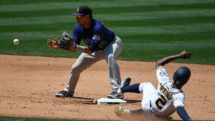 Acción del partido entre Rockies y Padres