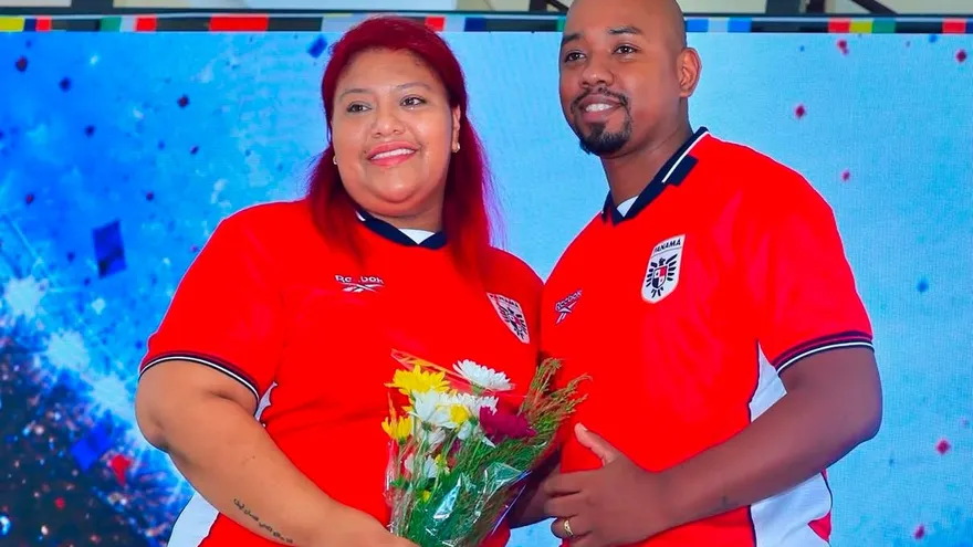 With love and football: 37 couples seal their union in mass civil wedding
