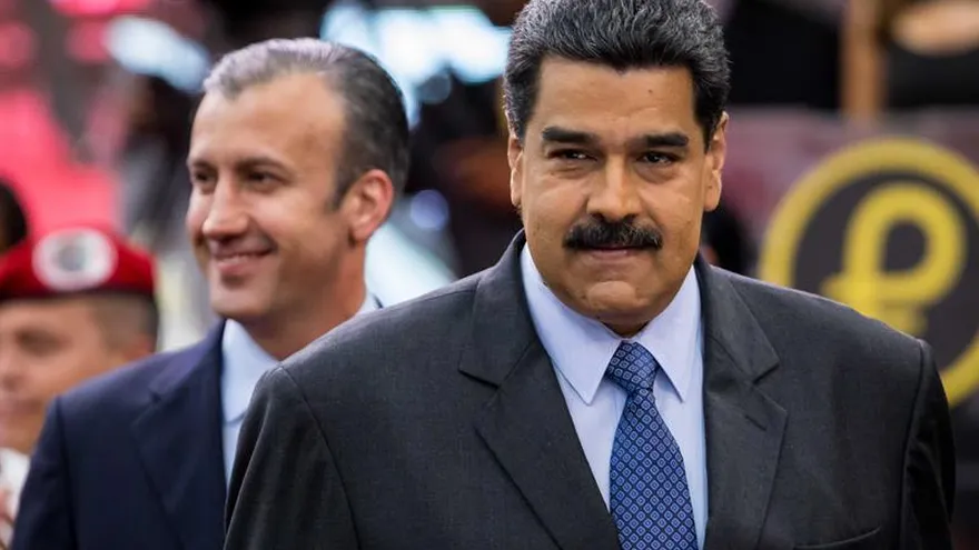 En la imagen, el presidente de Venezuela, Nicolás Maduro, acompañado del vicepresidente venezolano Tareck El Aissami (detrás).
