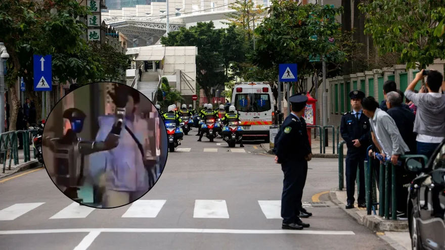 Foto ilustrativa de servicios de emergencia en Macau y en una burbuja, la captura del robot junto a la mujer