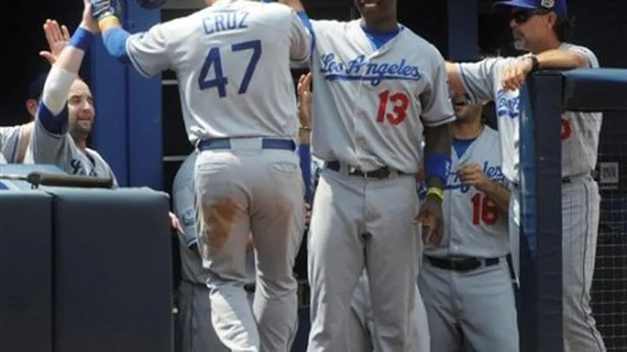 Cruz bota la pelota y Dodgers blanquean a Bravos